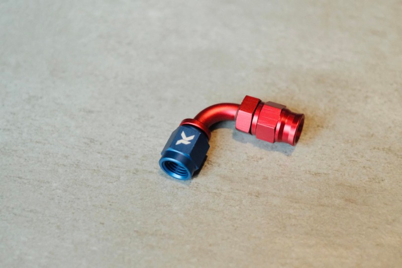 TK Racing - Đầu dầu cong 90 độ