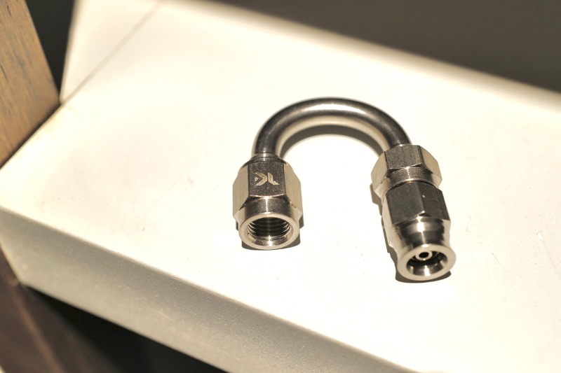 TK Racing - Đầu dầu Inox cong 180 độ